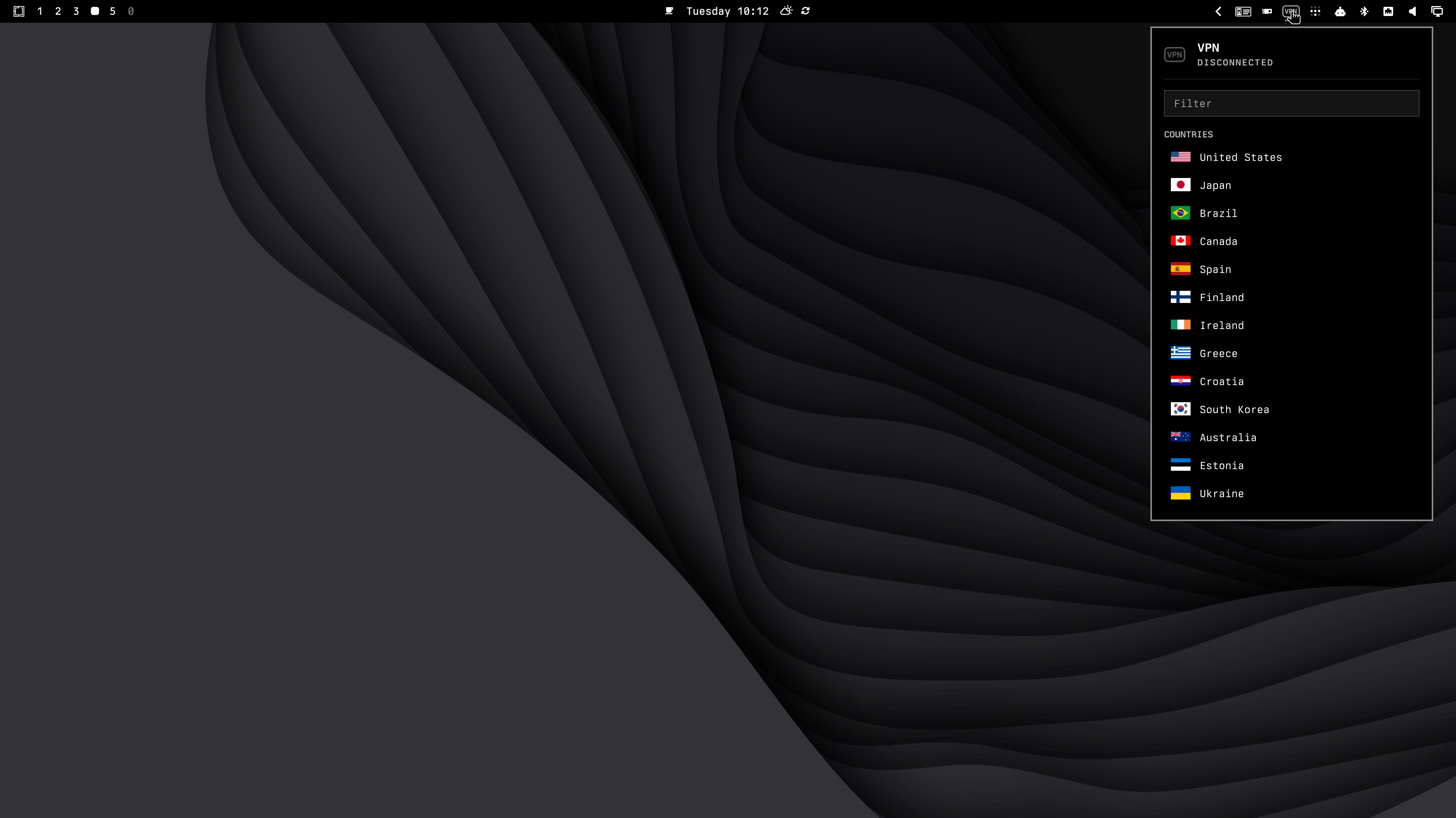 The VPN panel open on the desktop, listing countries with their flags